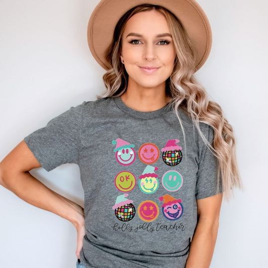 "Holly Jolly Teacher Faces" Tori Artis Teacher T-shirt - Teacher Care Crate - T-Shirt
