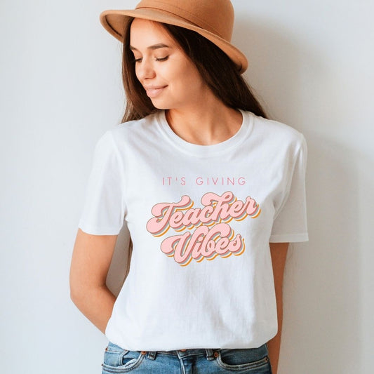 "It's Giving Teacher Vibes" Pink Teacher T-Shirt - Teacher Care Crate - T-Shirt