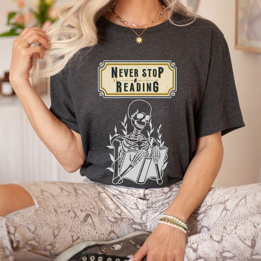 "Never Stop Reading" Teacher T-shirt - Teacher Care Crate - T-Shirt