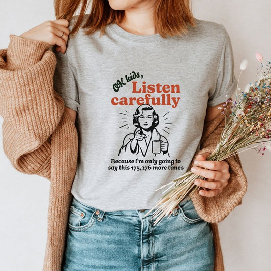 "Ok Kids Listen Carefully..." Funny Teacher T-shirt - Teacher Care Crate - T-Shirt