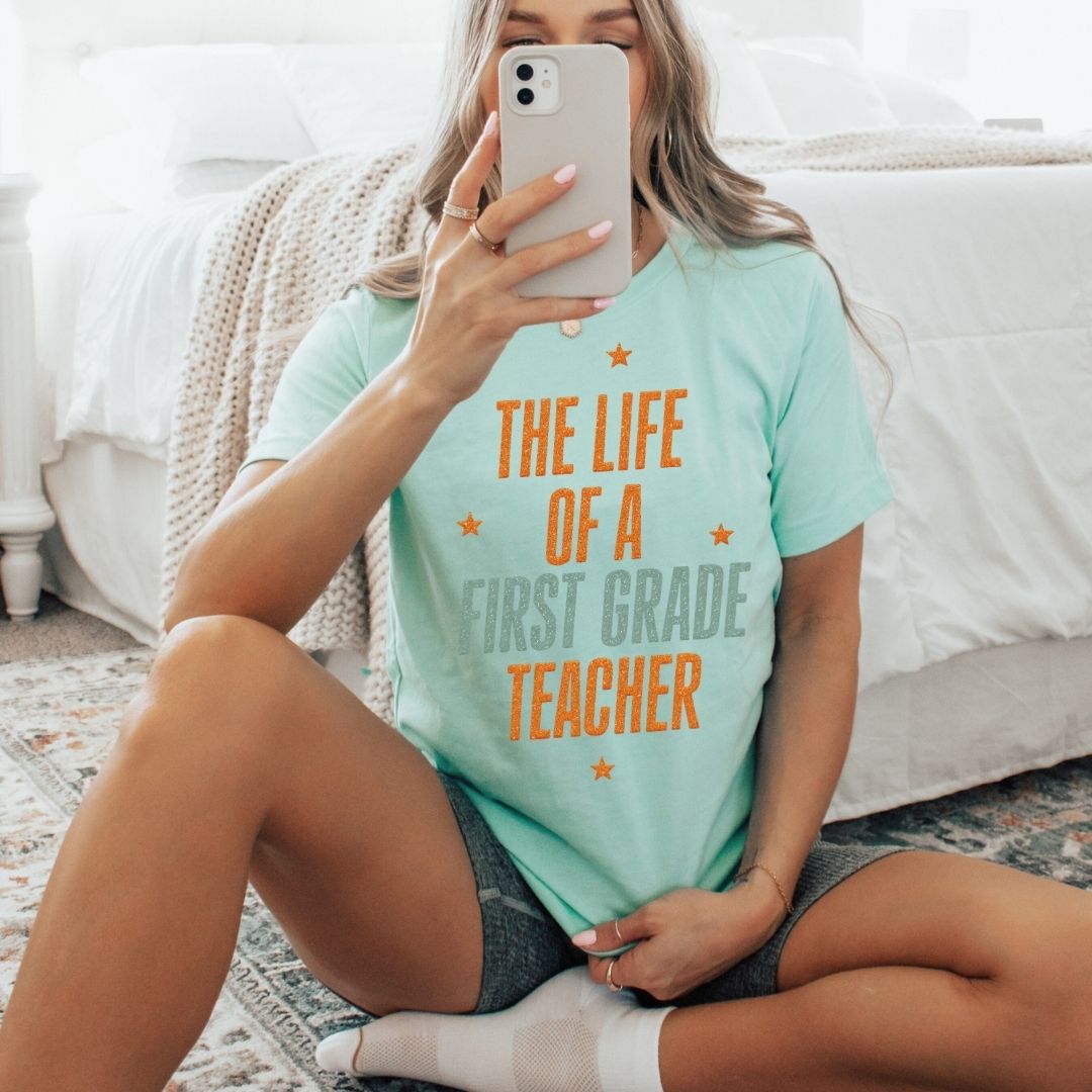 "The Life of a First Grade Teacher" Swiftie Teacher T-shirt - Teacher Care Crate - T-Shirt