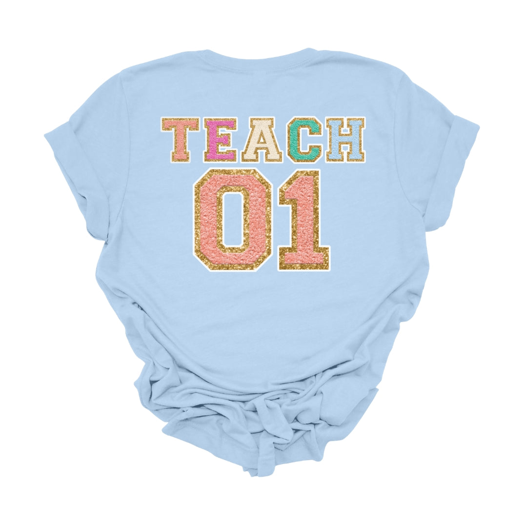 "Varsity Teach First Grade" Teacher T-shirt