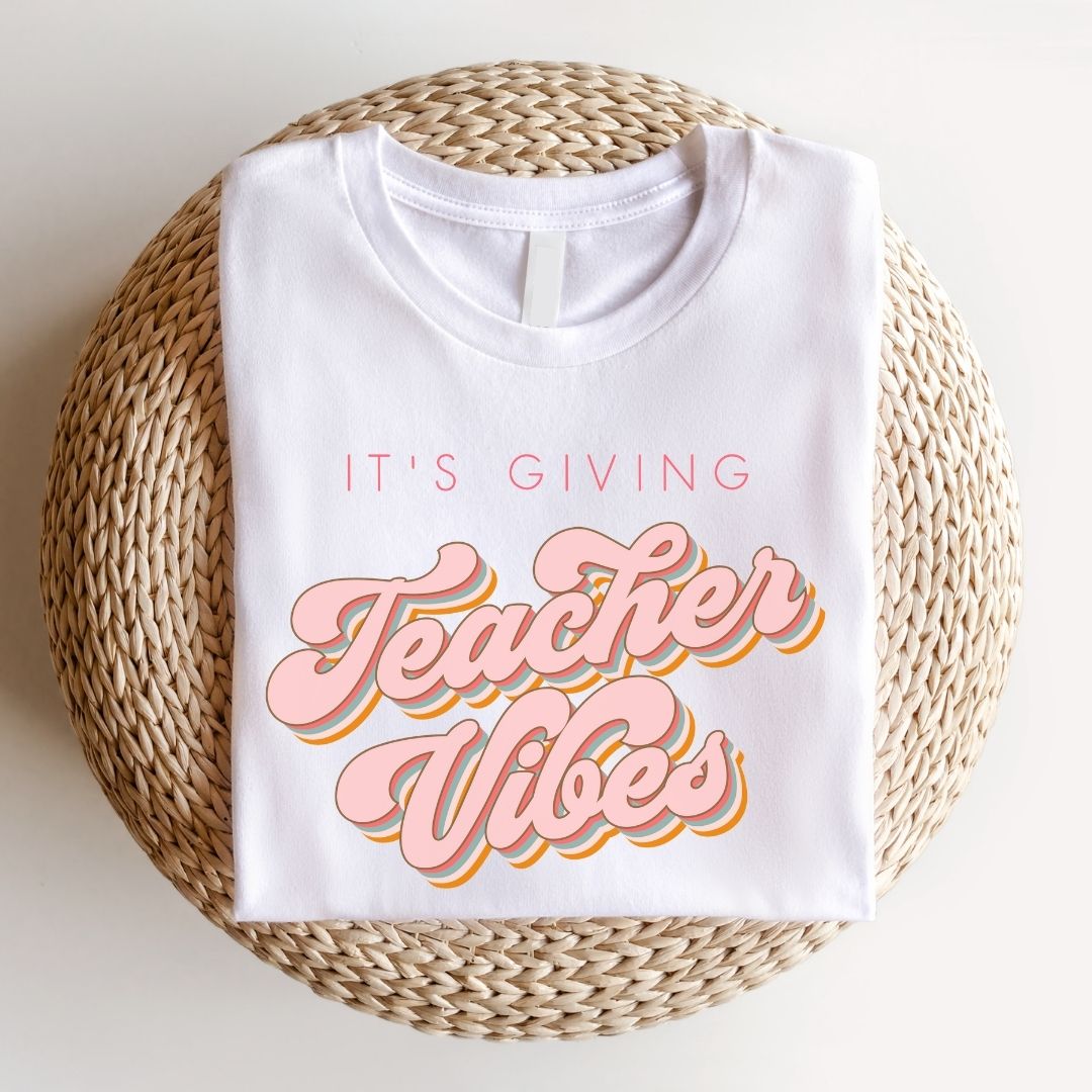 "It's Giving Teacher Vibes" Pink Teacher T-Shirt