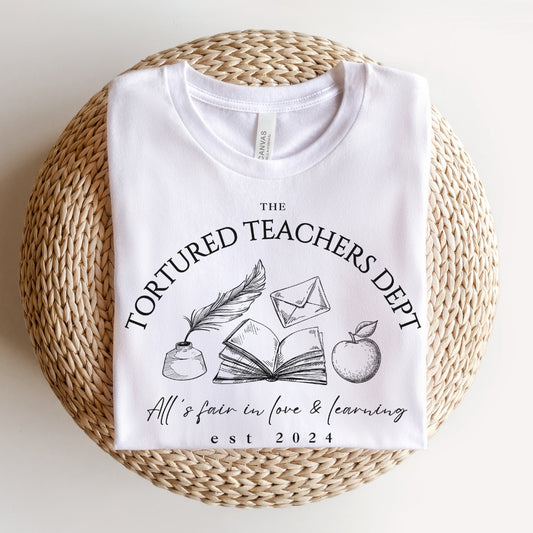"The Tortured Teachers Department" Apple Teacher T-shirt