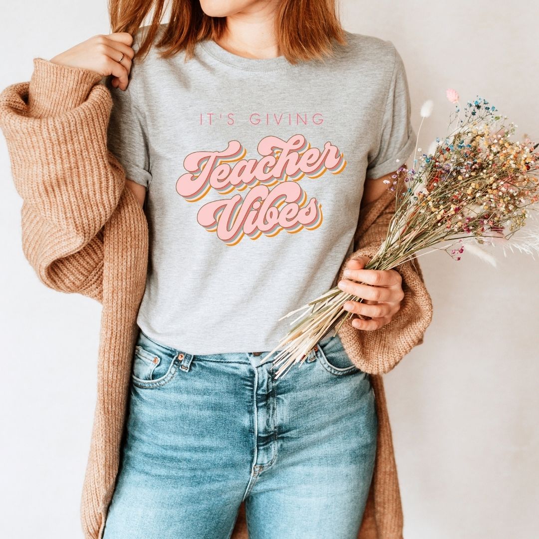 "It's Giving Teacher Vibes" Pink Teacher T-Shirt