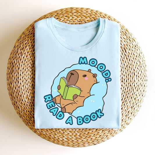 "MOOD: Read A Book" Capybara Teacher T-shirt - Teacher Care Crate-T-Shirt