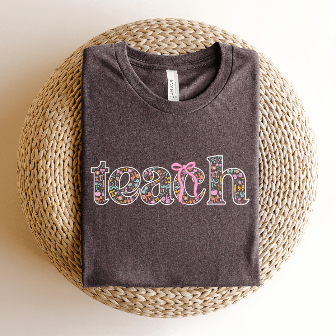 "Teach" Coquette Pattern Teacher T-shirt - Teacher Care Crate - T-Shirt