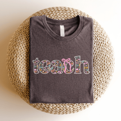 "Teach" Coquette Pattern Teacher T-shirt - Teacher Care Crate - T-Shirt