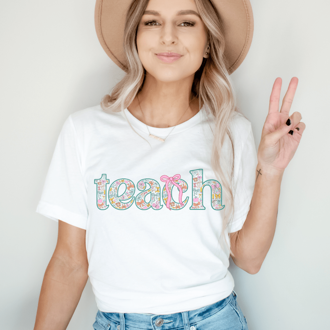 "Teach" Coquette Pattern Teacher T-shirt - Teacher Care Crate - T-Shirt