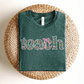 "Teach" Coquette Pattern Teacher T-shirt - Teacher Care Crate - T-Shirt