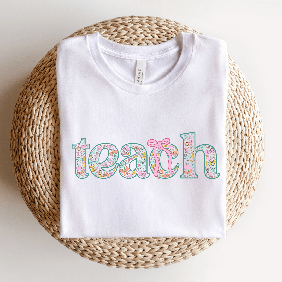 "Teach" Coquette Pattern Teacher T-shirt - Teacher Care Crate - T-Shirt