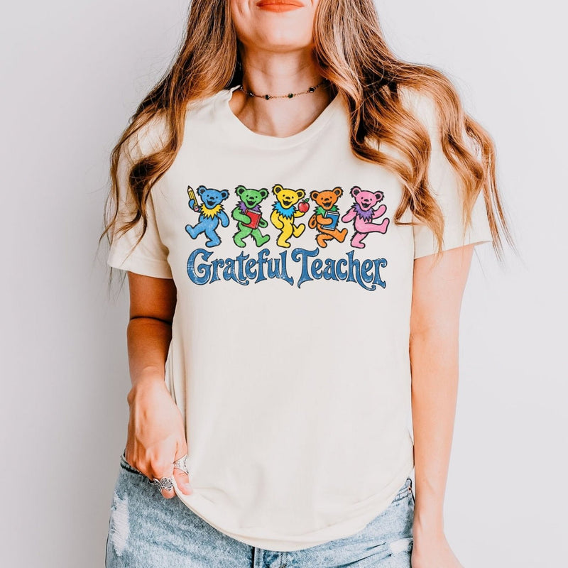 A teacher wearing the Grateful Teacher tee