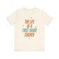 "The Life of a First Grade Teacher" Swiftie Teacher T-shirt - Teacher Care Crate - T-Shirt