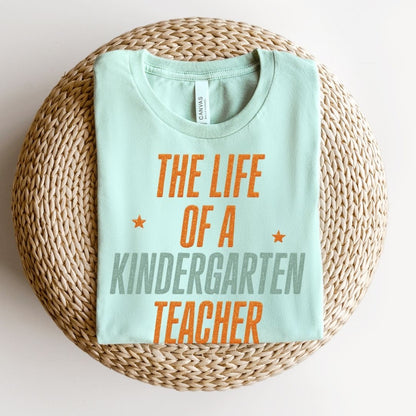 "The Life of a Kindergarten Teacher" Swiftie Teacher T-shirt - Teacher Care Crate - T-Shirt