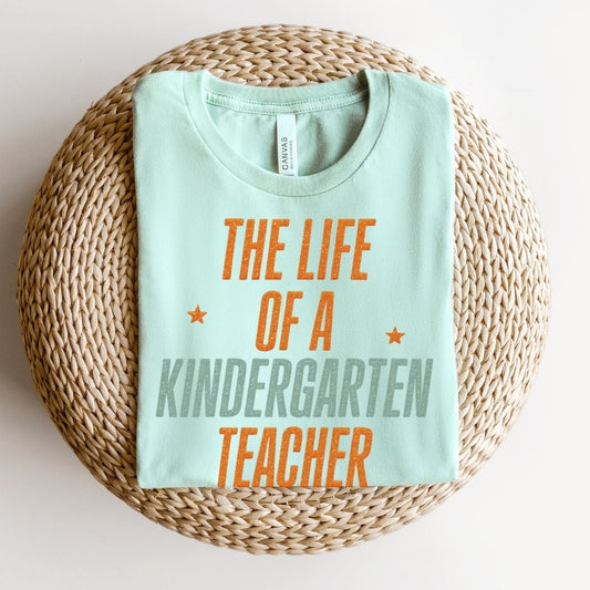 "The Life of a Kindergarten Teacher" Swiftie Teacher T-shirt - Teacher Care Crate - T-Shirt